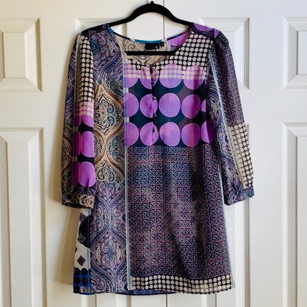 NWOT. See-through multi-patterned top.